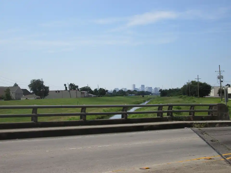Bridge over drainage canal at Jefferson Parish / New Orleans line at the back pa