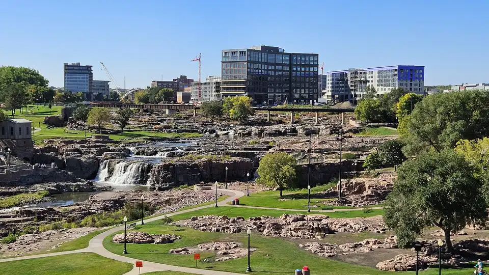 Downtown Sioux Falls and the falls of the Big Sioux river as seen from the viewi